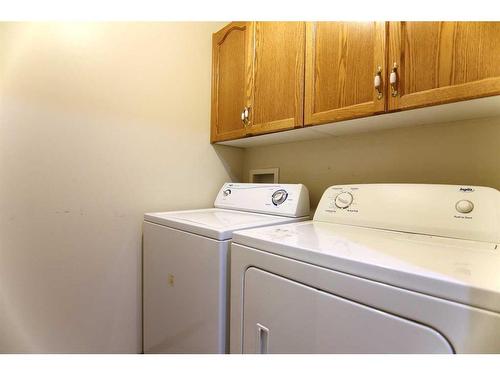 5015 48 Street, Sylvan Lake, AB - Indoor Photo Showing Laundry Room