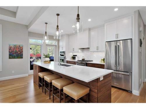 8 Sweetgrass Place, Sylvan Lake, AB - Indoor Photo Showing Kitchen With Double Sink With Upgraded Kitchen