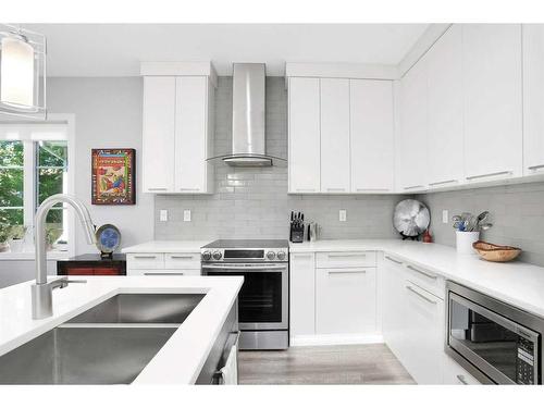 4607 45 Street, Red Deer, AB - Indoor Photo Showing Kitchen With Double Sink With Upgraded Kitchen