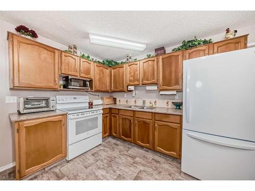 16 Cameron Crescent, Red Deer, AB - Indoor Photo Showing Kitchen With Double Sink