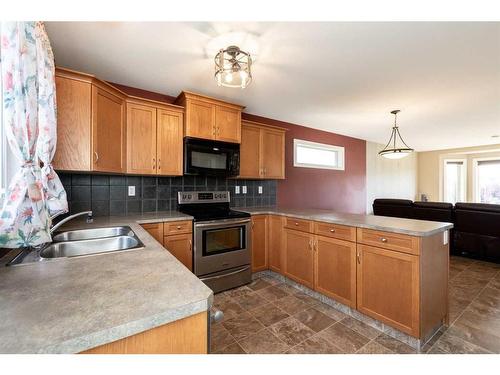 165 Kelloway Crescent, Red Deer, AB - Indoor Photo Showing Kitchen With Double Sink