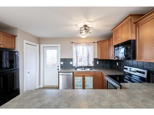 165 Kelloway Crescent, Red Deer, AB - Indoor Photo Showing Kitchen With Double Sink