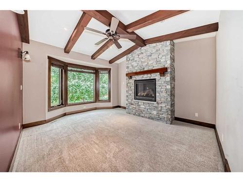 12 Cronquist Close, Red Deer, AB - Indoor Photo Showing Living Room With Fireplace