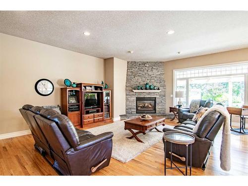 6240 Cronquist Drive, Red Deer, AB - Indoor Photo Showing Living Room With Fireplace