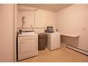 101-303-5134 43 Street, Red Deer, AB  - Indoor Photo Showing Laundry Room 