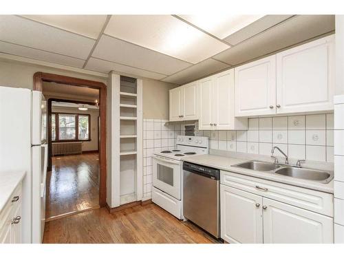 4754 55 Street, Red Deer, AB - Indoor Photo Showing Kitchen With Double Sink