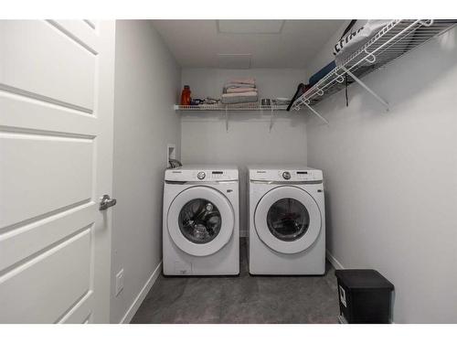 1201-220 Seton Grove Se, Calgary, AB - Indoor Photo Showing Laundry Room