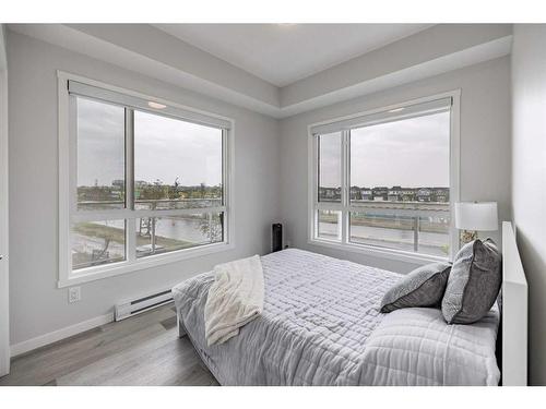 1201-220 Seton Grove Se, Calgary, AB - Indoor Photo Showing Bedroom