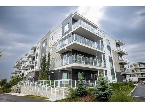 1201-220 Seton Grove Se, Calgary, AB - Outdoor With Balcony With Facade