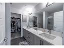 1201-220 Seton Grove Se, Calgary, AB  - Indoor Photo Showing Bathroom 