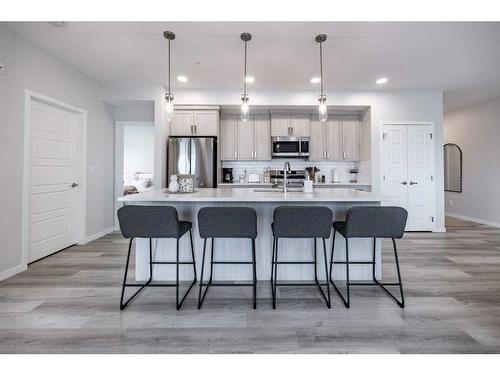 1201-220 Seton Grove Se, Calgary, AB - Indoor Photo Showing Kitchen With Upgraded Kitchen