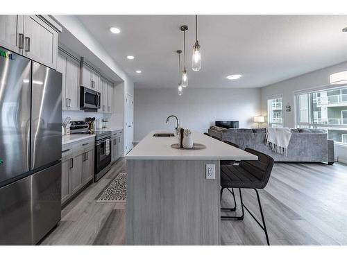 1201-220 Seton Grove Se, Calgary, AB - Indoor Photo Showing Kitchen With Upgraded Kitchen