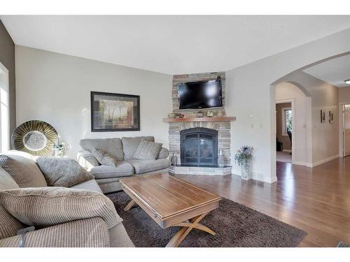 524 Summer Crescent, Rural Ponoka County, AB - Indoor Photo Showing Living Room With Fireplace