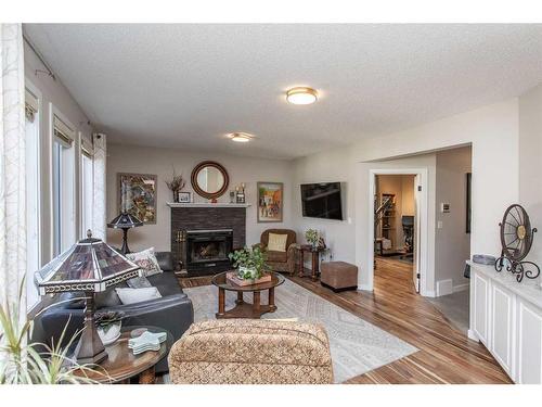 40 Alton Close, Red Deer, AB - Indoor Photo Showing Living Room With Fireplace