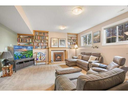 30 Abraham Close, Red Deer, AB - Indoor Photo Showing Living Room With Fireplace