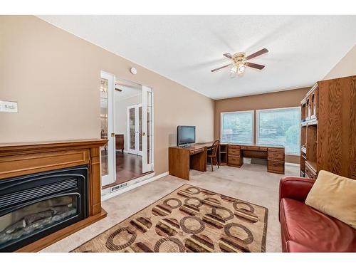 23 Stirling Close, Red Deer, AB - Indoor Photo Showing Living Room With Fireplace