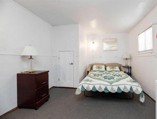 192A Beach Drive, Rural Ponoka County, AB - Indoor Photo Showing Bedroom