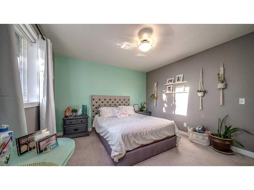 209 Strathford Bay, Strathmore, AB - Indoor Photo Showing Bedroom