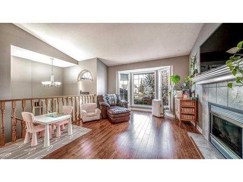 209 Strathford Bay, Strathmore, AB - Indoor Photo Showing Living Room With Fireplace