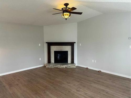 5416 49 Avenue West, Forestburg, AB - Indoor Photo Showing Living Room With Fireplace