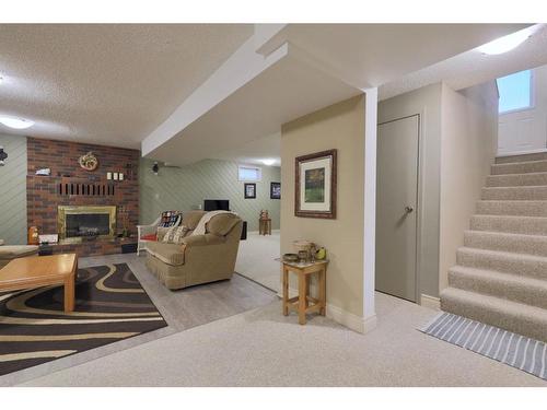 3905 67 Street, Camrose, AB - Indoor With Fireplace