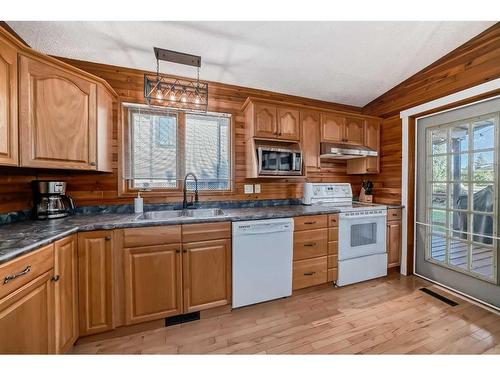 5048 Lakeshore Drive, Sylvan Lake, AB - Indoor Photo Showing Kitchen With Double Sink