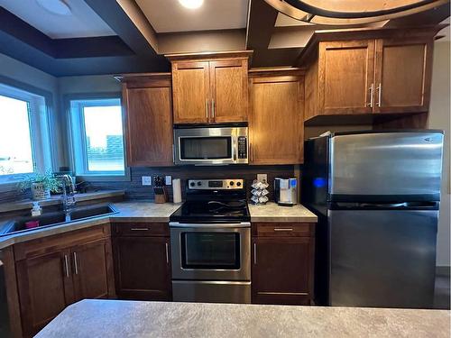 5928 62 Avenue, Ponoka, AB - Indoor Photo Showing Kitchen With Double Sink