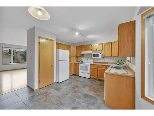 88 Dixon Crescent, Red Deer, AB - Indoor Photo Showing Kitchen With Double Sink