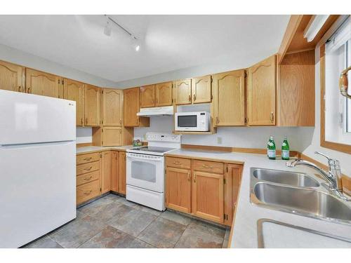 88 Dixon Crescent, Red Deer, AB - Indoor Photo Showing Kitchen With Double Sink