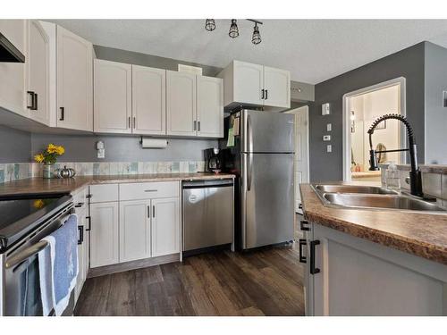 4021 69 A Street Close, Camrose, AB - Indoor Photo Showing Kitchen With Double Sink