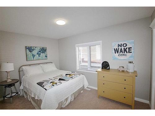 308 Marina Bay Place, Sylvan Lake, AB - Indoor Photo Showing Bedroom