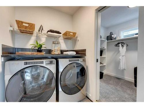 341 Sora Way Se, Calgary, AB - Indoor Photo Showing Laundry Room