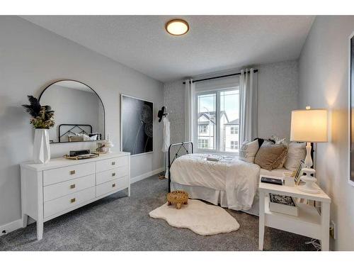 341 Sora Way Se, Calgary, AB - Indoor Photo Showing Bedroom