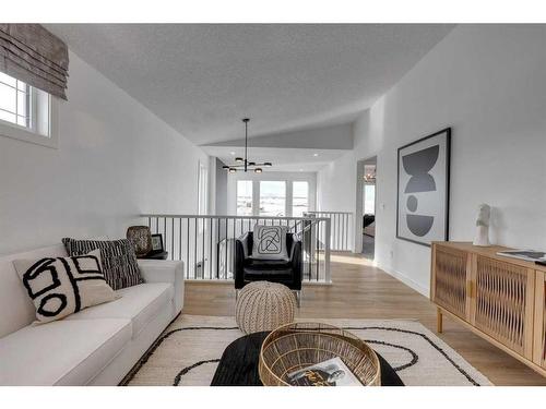 341 Sora Way Se, Calgary, AB - Indoor Photo Showing Living Room