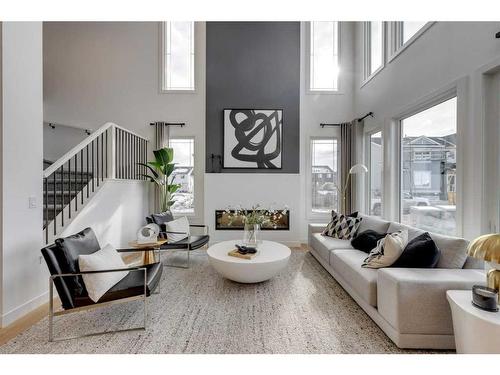 341 Sora Way Se, Calgary, AB - Indoor Photo Showing Living Room With Fireplace