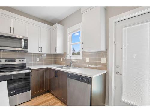 68 Windermere Close, Red Deer, AB - Indoor Photo Showing Kitchen With Double Sink