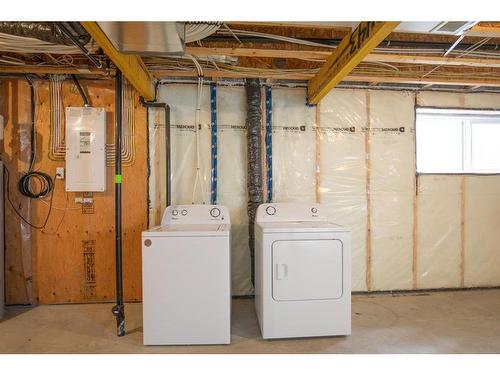 68 Windermere Close, Red Deer, AB - Indoor Photo Showing Laundry Room