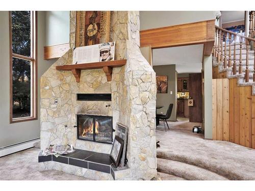 37441 Range Road 271, Rural Red Deer County, AB - Indoor Photo Showing Other Room With Fireplace