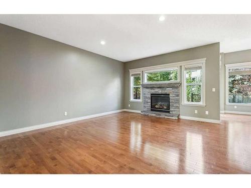 11767 Valley Ridge Boulevard Nw, Calgary, AB - Indoor Photo Showing Living Room With Fireplace