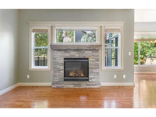 11767 Valley Ridge Boulevard Nw, Calgary, AB - Indoor Photo Showing Living Room With Fireplace