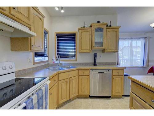 120 Lancaster Drive, Red Deer, AB - Indoor Photo Showing Kitchen With Double Sink