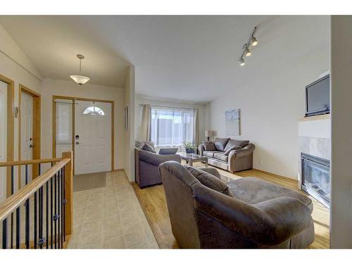 120 Lancaster Drive, Red Deer, AB - Indoor Photo Showing Other Room With Fireplace