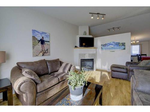 120 Lancaster Drive, Red Deer, AB - Indoor Photo Showing Living Room With Fireplace