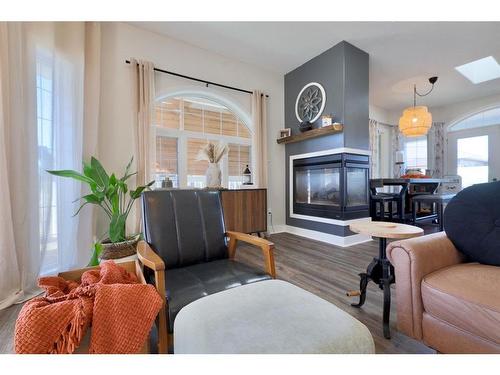 7208 44 Avenue Close, Camrose, AB - Indoor Photo Showing Living Room With Fireplace