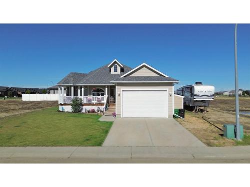 7208 44 Avenue Close, Camrose, AB - Outdoor With Deck Patio Veranda With Facade