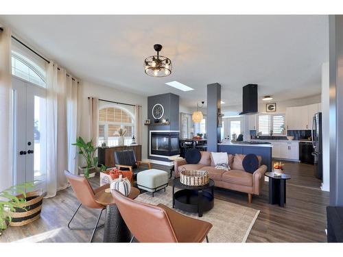 7208 44 Avenue Close, Camrose, AB - Indoor Photo Showing Living Room With Fireplace