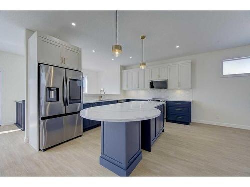 54 Lindman Avenue, Red Deer, AB - Indoor Photo Showing Kitchen With Upgraded Kitchen