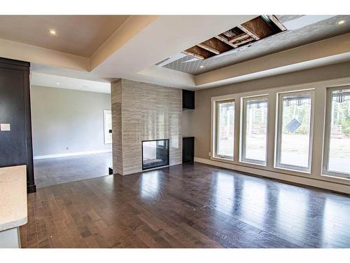 297 Jarvis Glen Way, Jarvis Bay, AB - Indoor With Fireplace