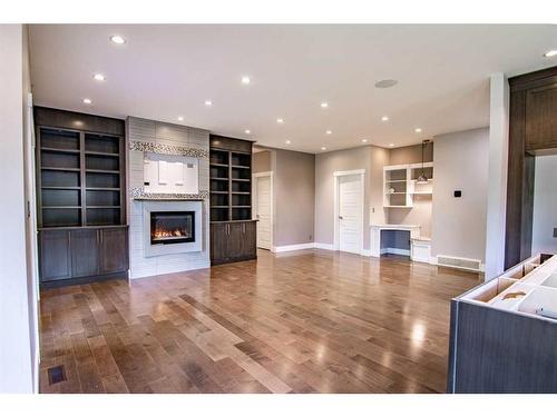 297 Jarvis Glen Way, Jarvis Bay, AB - Indoor Photo Showing Living Room With Fireplace