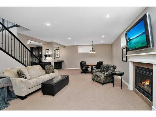 15 Volk Place, Red Deer, AB - Indoor Photo Showing Living Room With Fireplace